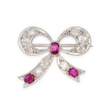 A DIAMOND AND RUBY BOW BROOCH in platinum, designed as a ribbon tied into a bow, set with cushion...