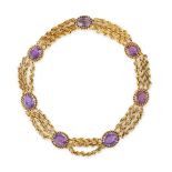 AN ANTIQUE VICTORIAN AMETHYST NECKLACE in yellow gold, comprising three rows of fancy link chains...