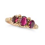 AN ANTIQUE GARNET THREE STONE RING in yellow gold, set with three oval cut garnets, no assay mark...