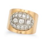 A RETRO DIAMOND DRESS RING in yellow gold, the wide tapering band set with a cluster of old cut d...