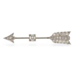 A DIAMOND ARROW BROOCH in yellow and white gold, set with an old cut diamond of approximately 0.5...