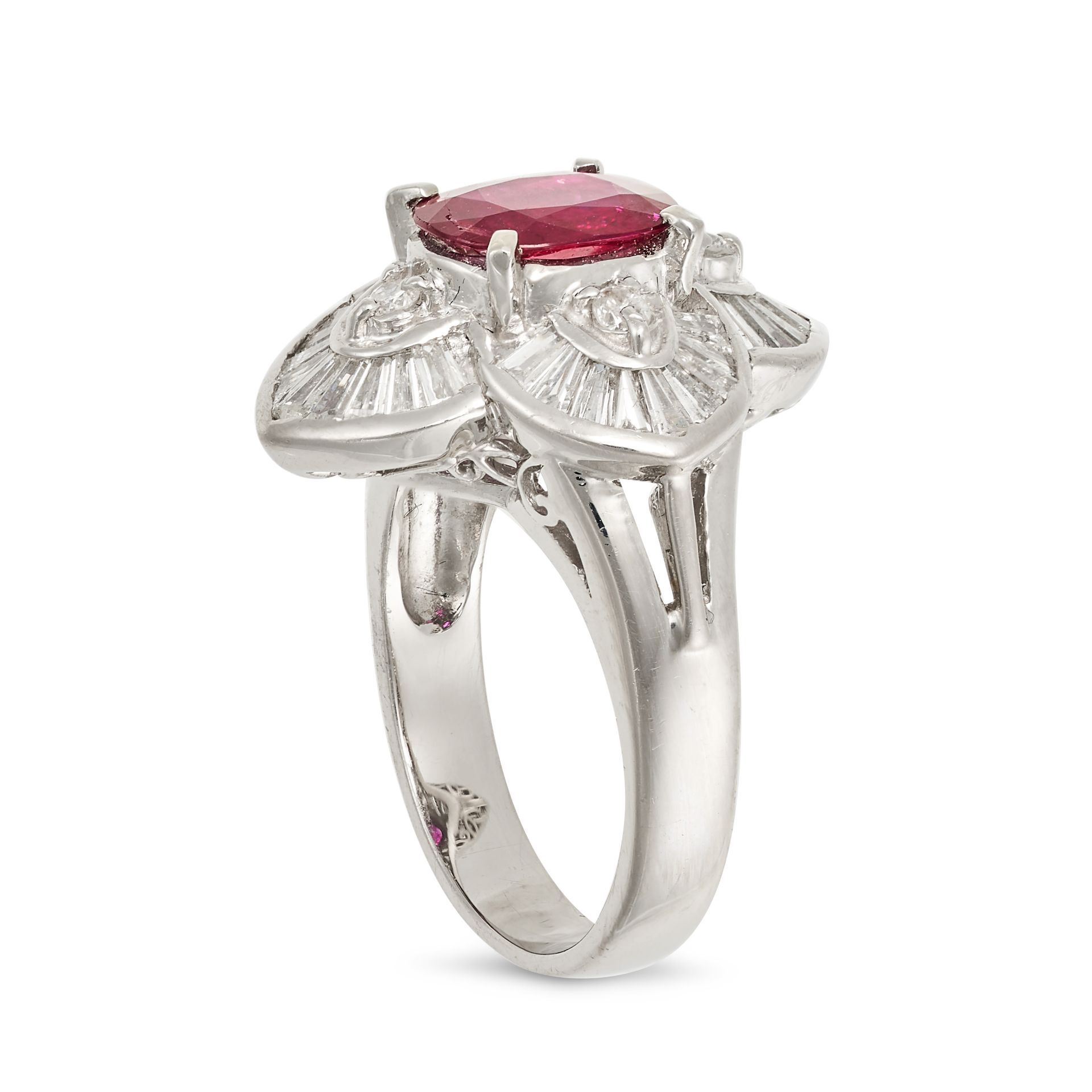 A RUBY AND DIAMOND CLUSTER RING in platinum, set with an oval cut ruby of 1.31 carats in a stylis... - Image 2 of 2