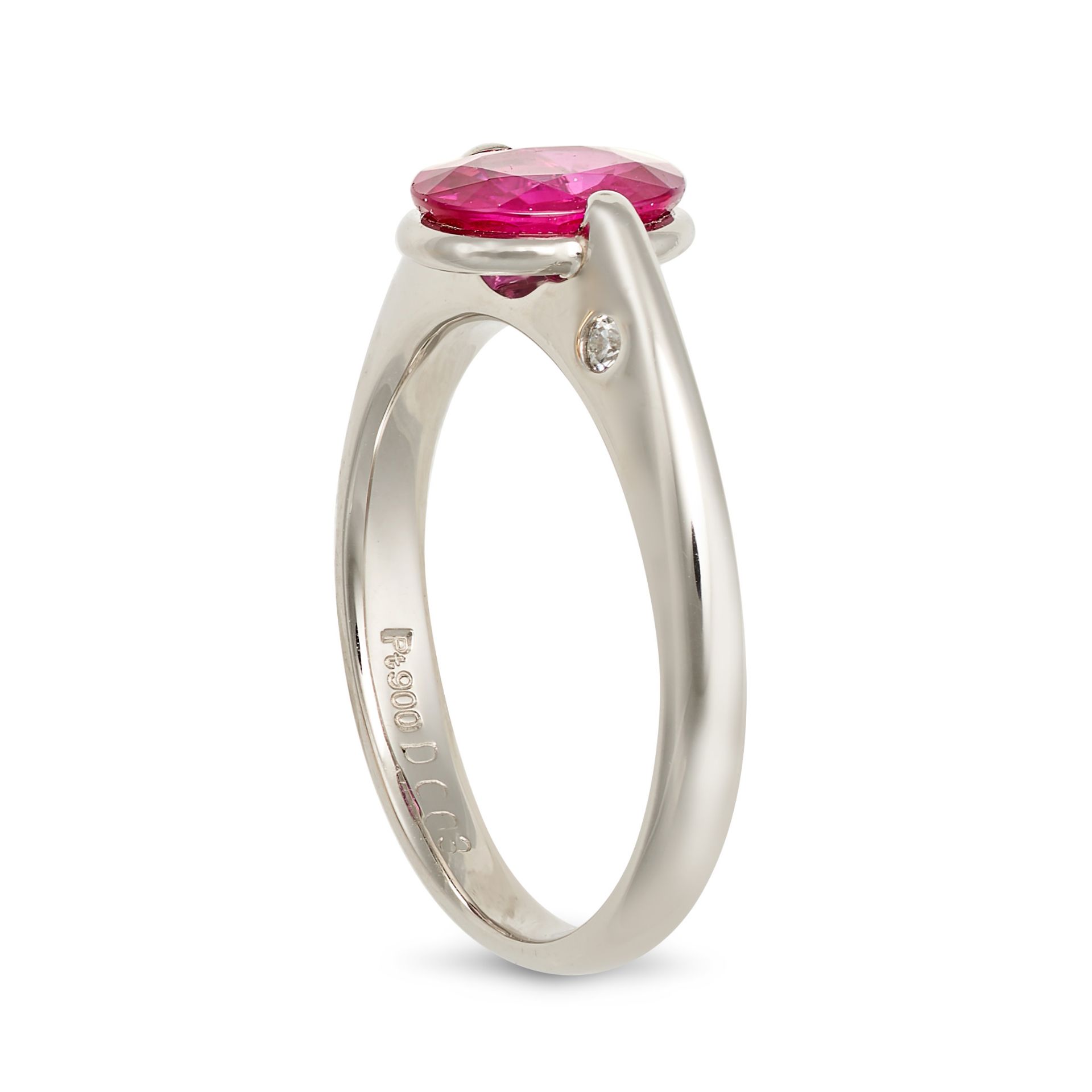 A RUBY AND DIAMOND RING in platinum, set with an oval cut ruby of 1.07 carats, the shoulders acce... - Image 2 of 2
