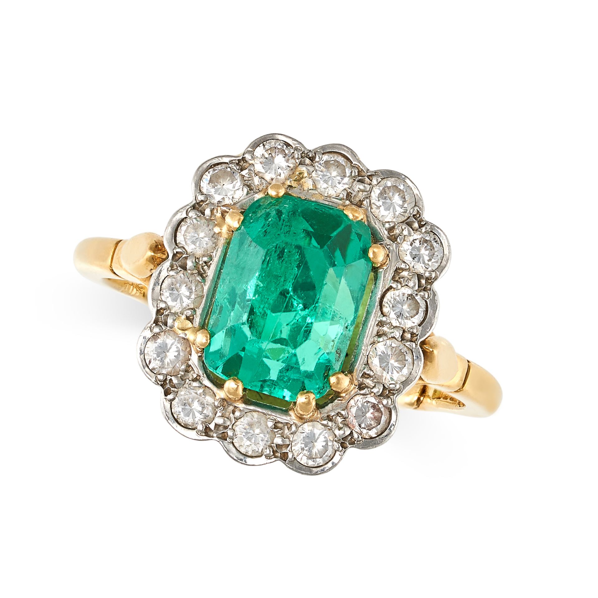A COLOMBIAN EMERALD AND DIAMOND CLUSTER RING in 18ct yellow and white gold, set with an octagonal...