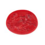 NO RESERVE - A RED GLASS INTAGLIO depicting Athena driving a chariot lead by two horses, 4.5cm, 1...