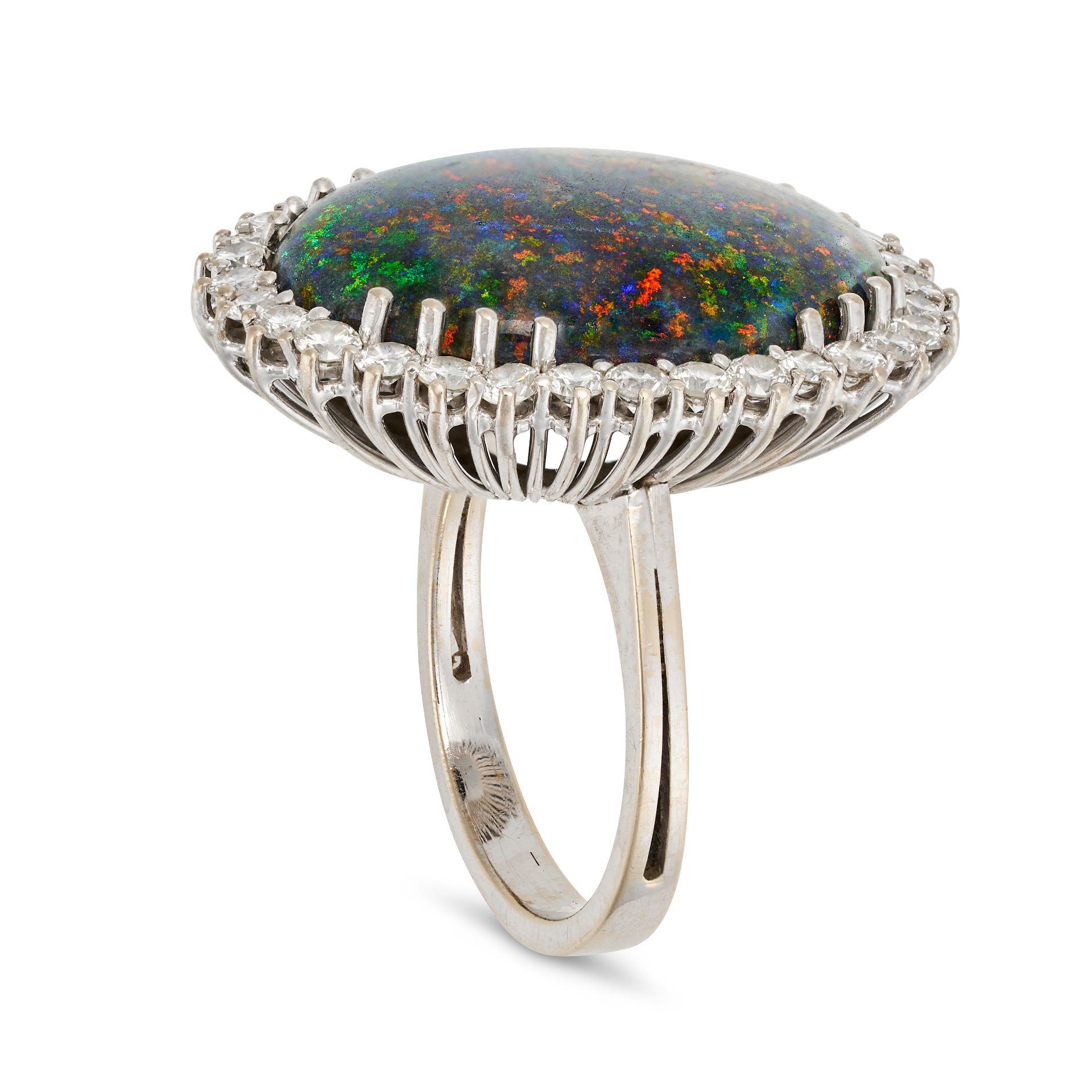 A BOULDER OPAL AND DIAMOND CLUSTER RING in white gold, set with an oval cabochon cut boulder opal... - Image 2 of 2