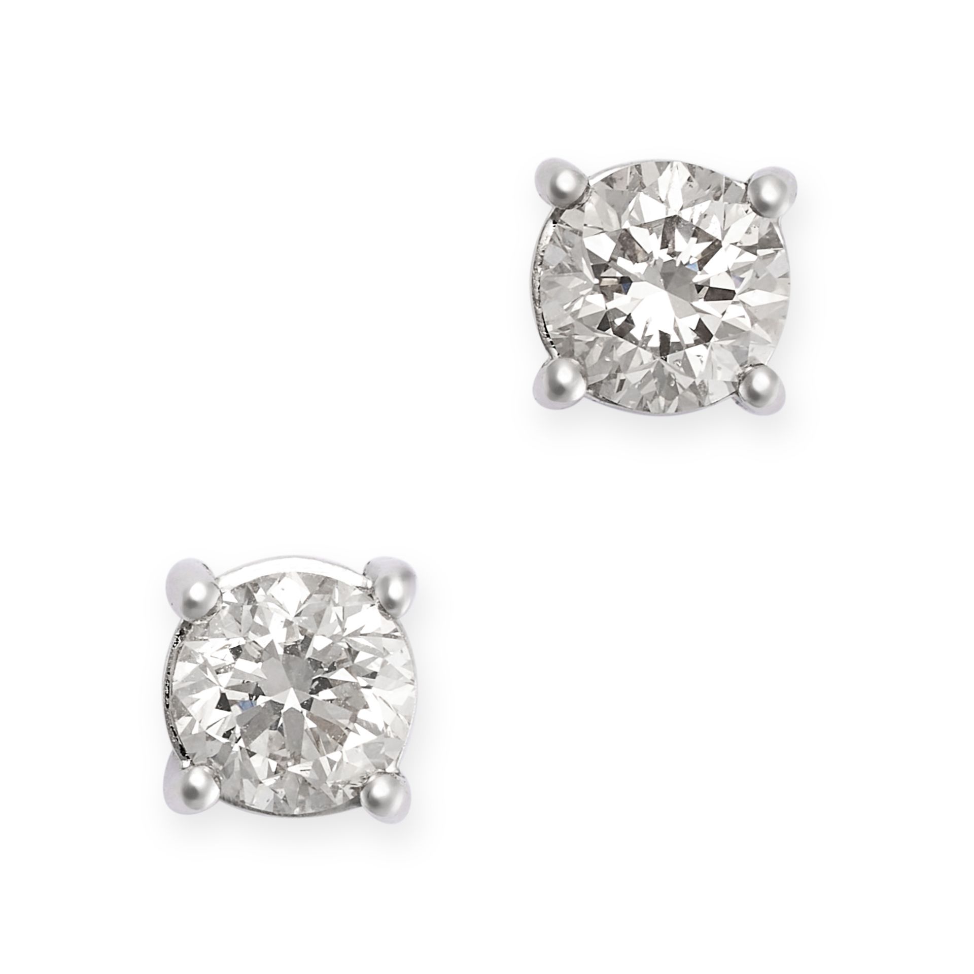 A PAIR OF DIAMOND STUD EARRINGS in 18ct white gold, each set with a round brilliant cut diamond, ...