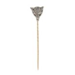 AN ANTIQUE RUBY AND DIAMOND FOX STICK / TIE PIN in 14ct yellow gold and silver, designed as the h...