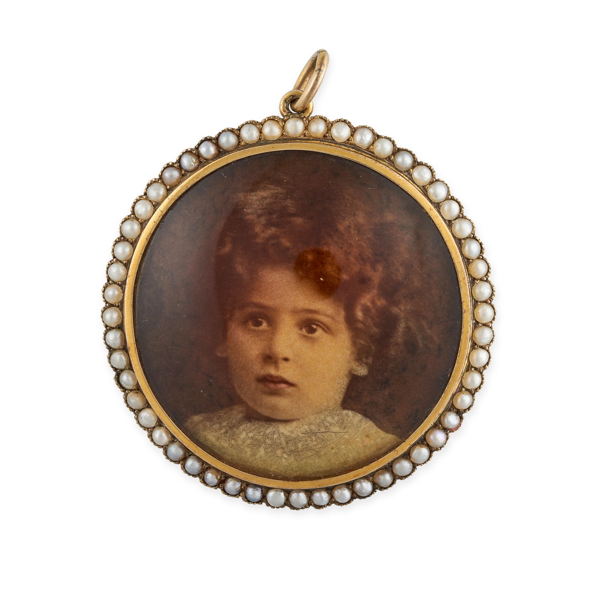 AN ANTIQUE MOURNING PORTRAIT MINIATURE AND PEARL PENDANT set with the photograph of a child in a ...