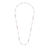 A PINK TOURMALINE AND TANZANITE CHAIN NECKLACE in 18ct white gold, the trace chain set with polis...