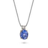 A SAPPHIRE AND DIAMOND PENDANT NECKLACE in 18ct yellow and white gold, the pendant set with an ov...