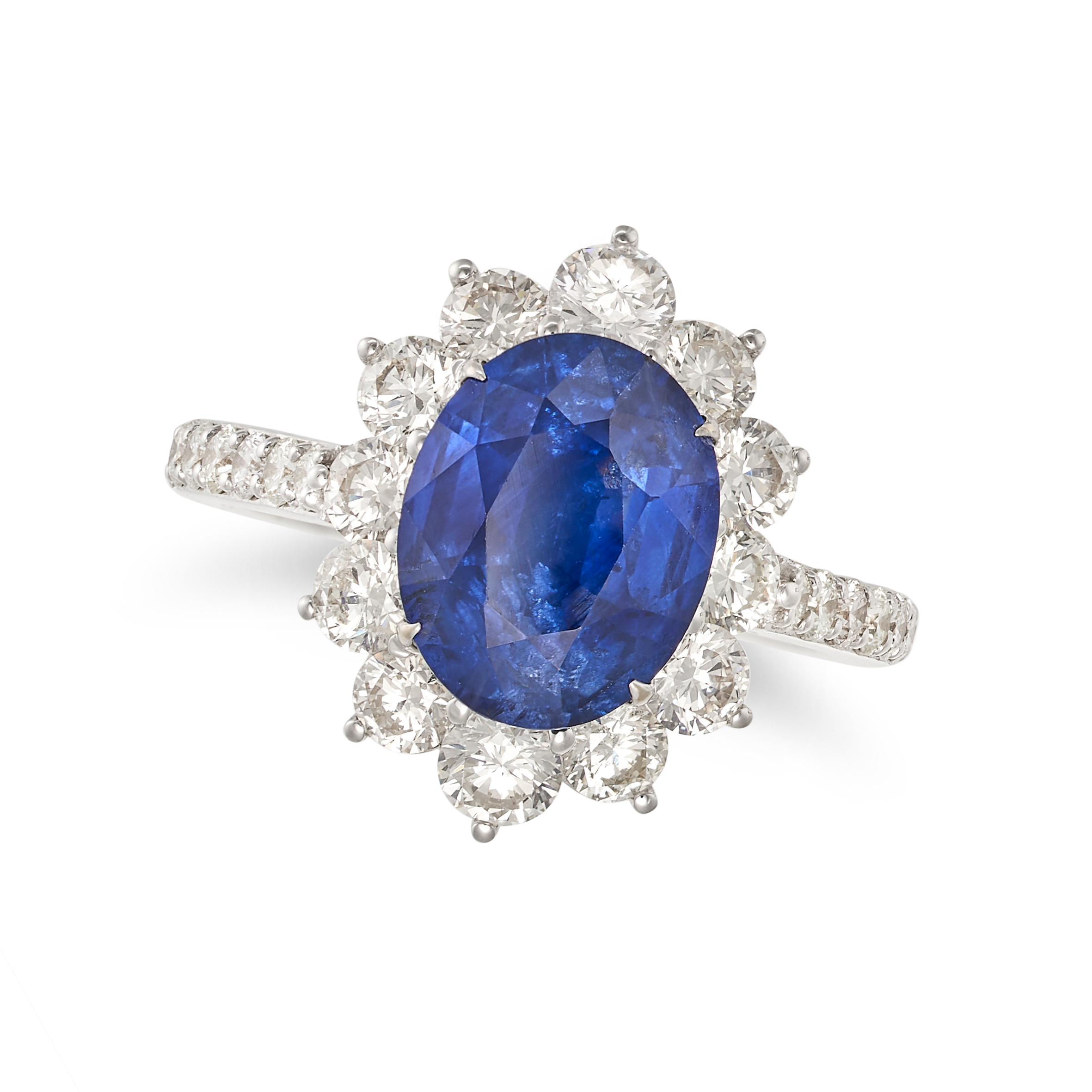 A SAPPHIRE AND DIAMOND CLUSTER RING in 18ct white gold, set with an oval cut sapphire of 4.53 car...