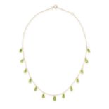 A PERIDOT NECKLACE in 18ct yellow gold, the trace chain suspending thirteen briolette cut peridot...