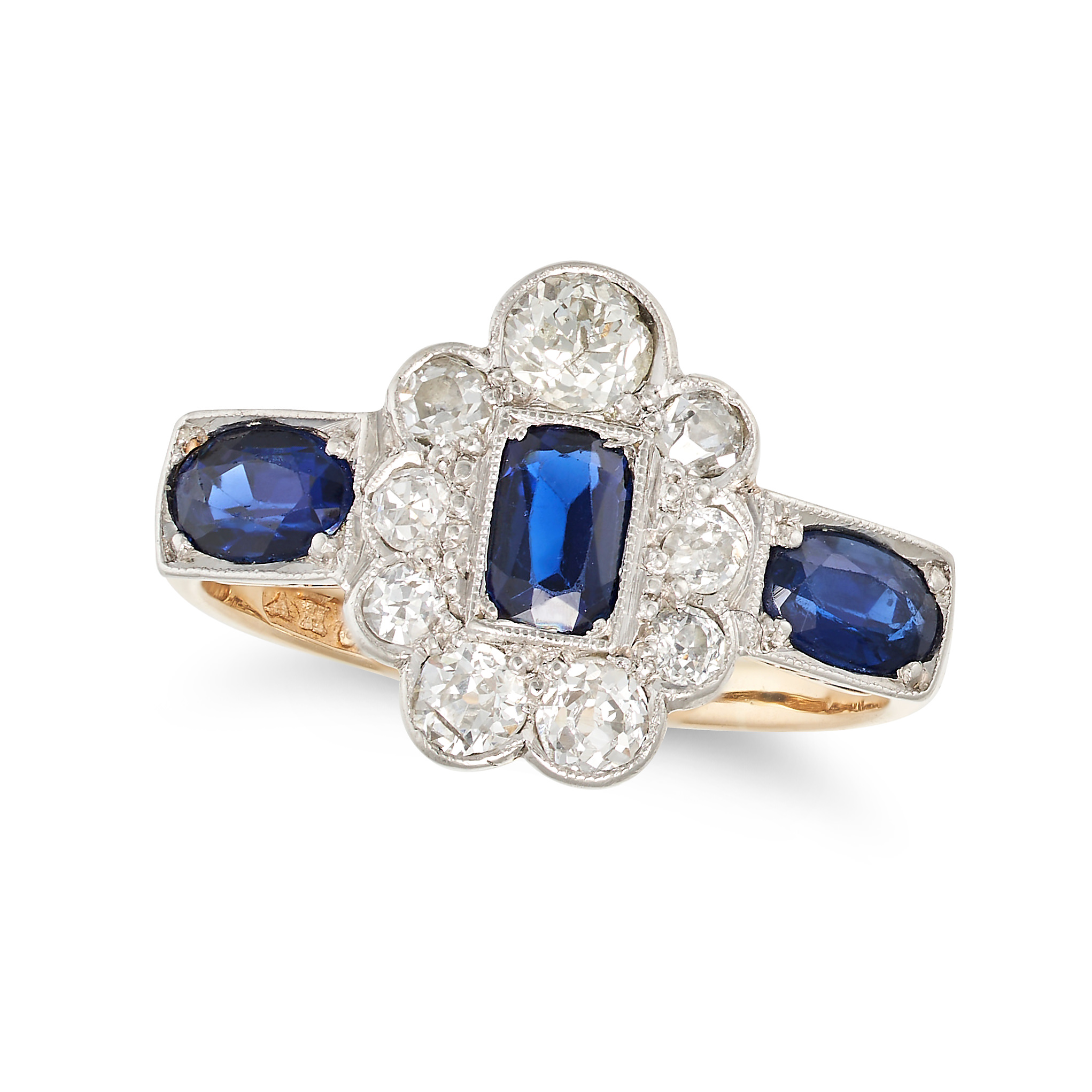 A VINTAGE, A SAPPHIRE AND DIAMOND RING in 18ct yellow gold and platinum, set with a cushion cut s...