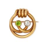 A FINE ANTIQUE DIAMOND AND DEMANTOID GARNET KNOT BROOCH, POSSIBLY RUSSIAN in 18ct yellow gold, se...