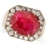 A 9.96 CARAT BURMA NO HEAT RUBY AND DIAMOND RING in yellow gold, set with an oval cut ruby of 9.9...