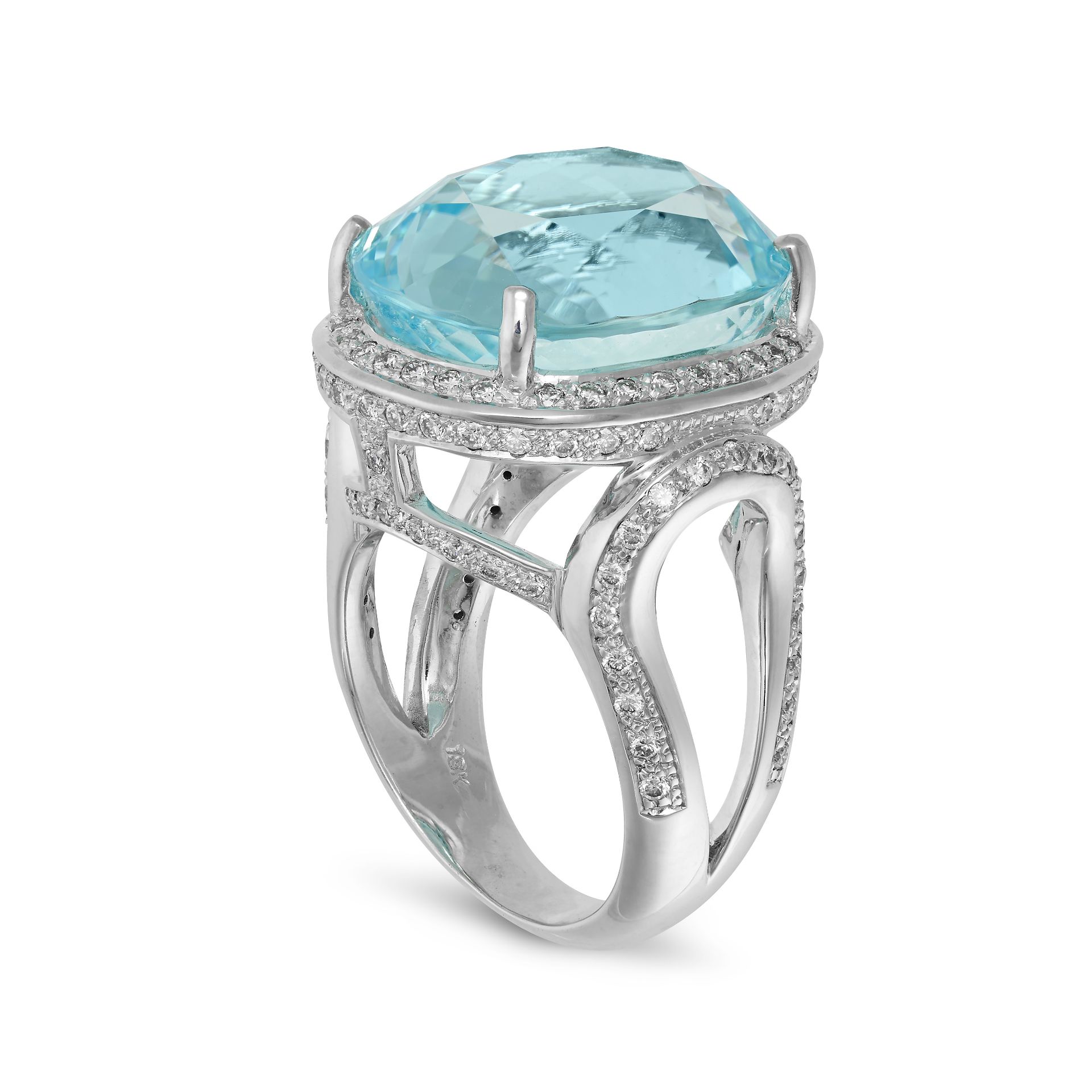 A PARAIBA TOURMALINE AND DIAMOND RING in 18ct white gold, set with an oval cut Paraiba tourmaline... - Image 2 of 2