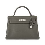 HERMES OLIVE KELLY 32 RETOURNE BAG Condition grade B-.  Produced in 2012. 32cm long, 22cm high....