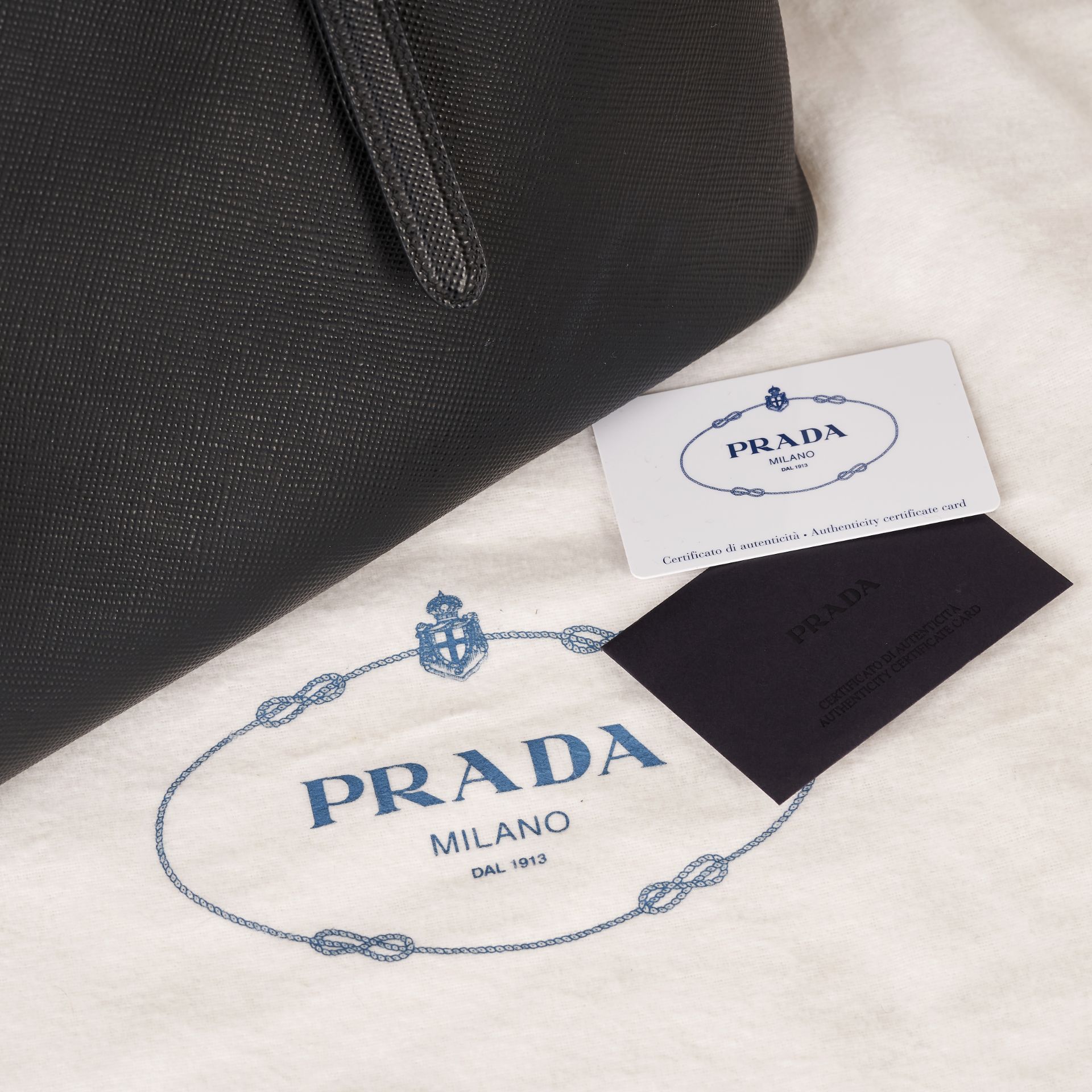 PRADA BLACK SAFFIANO TOP HANDLE BAG Condition grade B-. 35cm long, 28cm high. 16cm top handle d... - Image 12 of 12