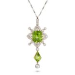 AN ANTIQUE PERIDOT AND DIAMOND PENDANT NECKLACE in yellow gold and platinum, the pendant set with...