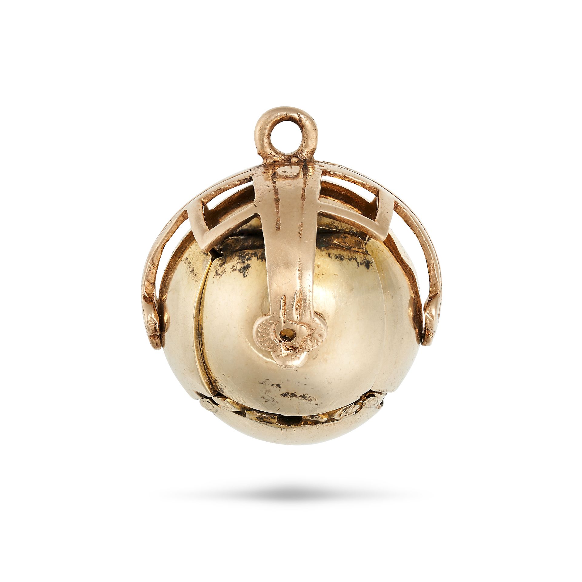 AN ANTIQUE MASONIC PUZZLE BALL PENDANT in 9ct yellow gold and silver, the spherical body opening ...