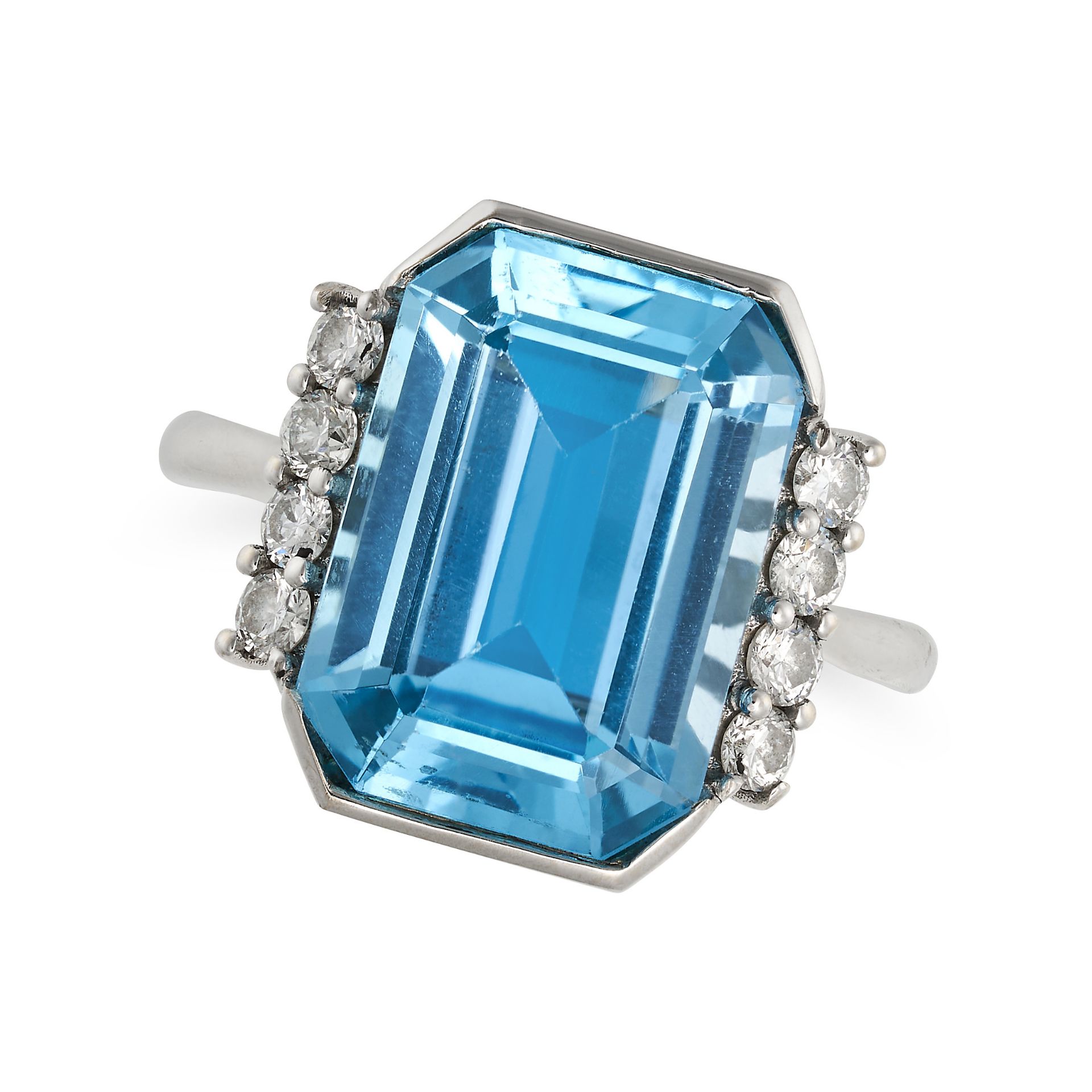 A BLUE TOPAZ AND DIAMOND RING in 18ct white gold, set with an octagonal step cut blue topaz of ap...