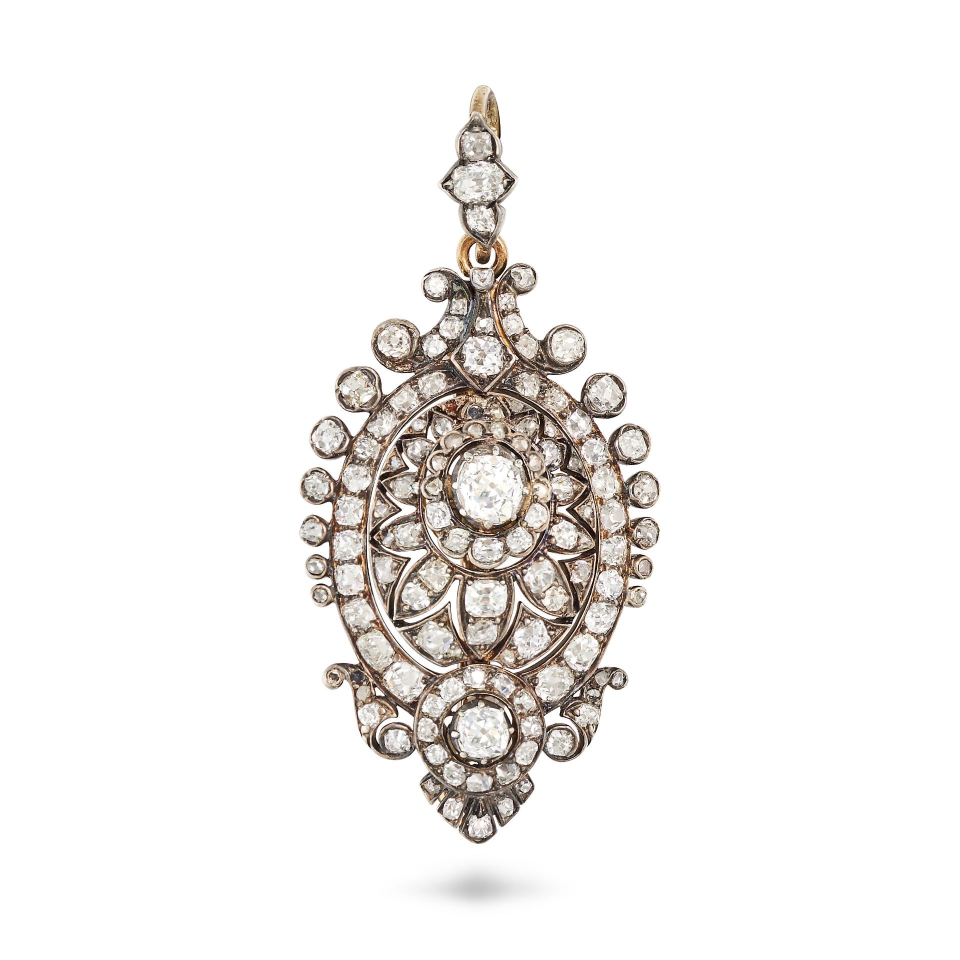 AN ANTIQUE DIAMOND BROOCH / PENDANT in yellow gold and silver, the domed openwork body set throug...