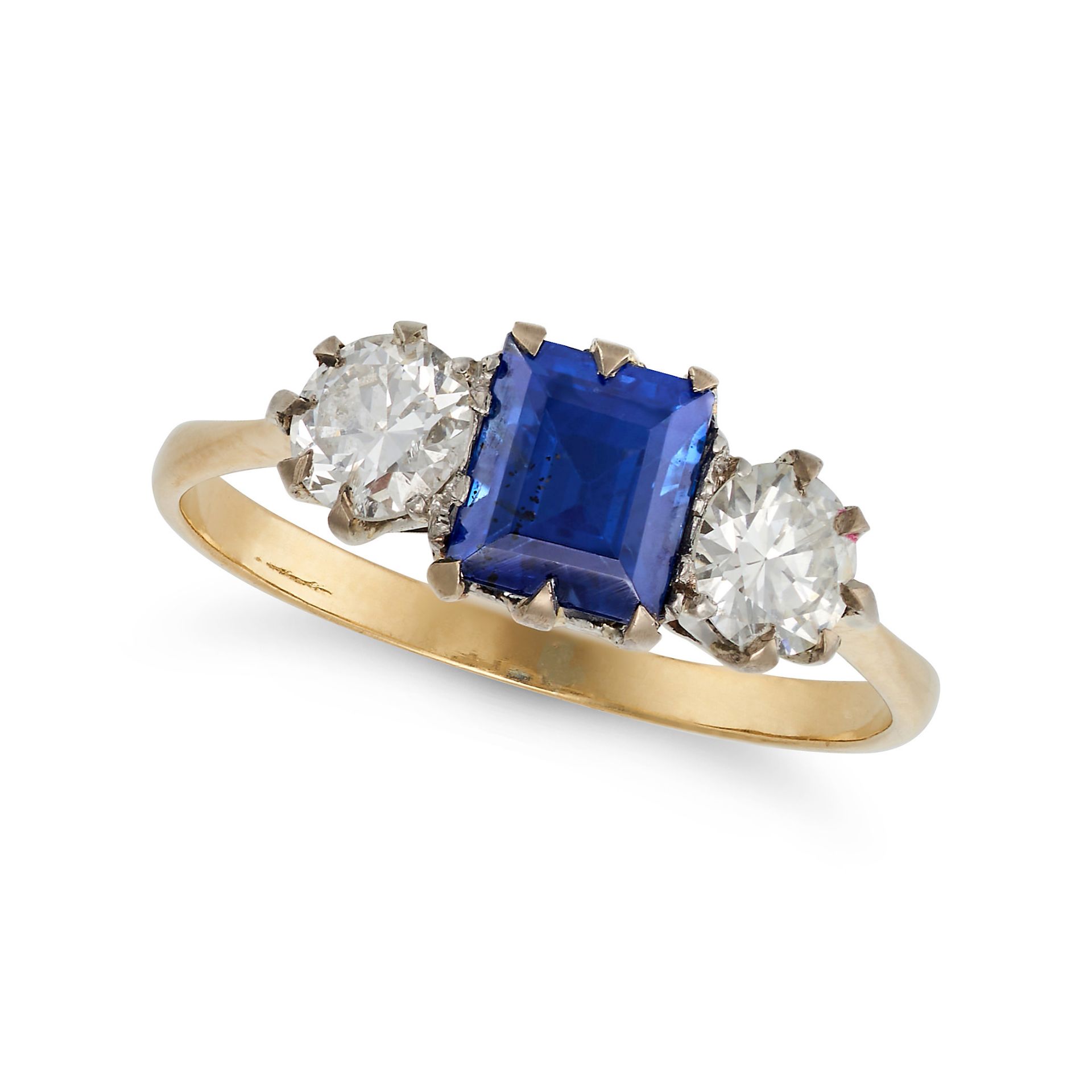 A SAPPHIRE AND DIAMOND THREE STONE RING in 18ct yellow gold, set with a square step cut sapphire ...