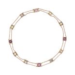 AN ANTIQUE STAR RUBY, MOONSTONE AND PEARL CHOKER NECKLACE in 9ct rose gold, set throughout with c...