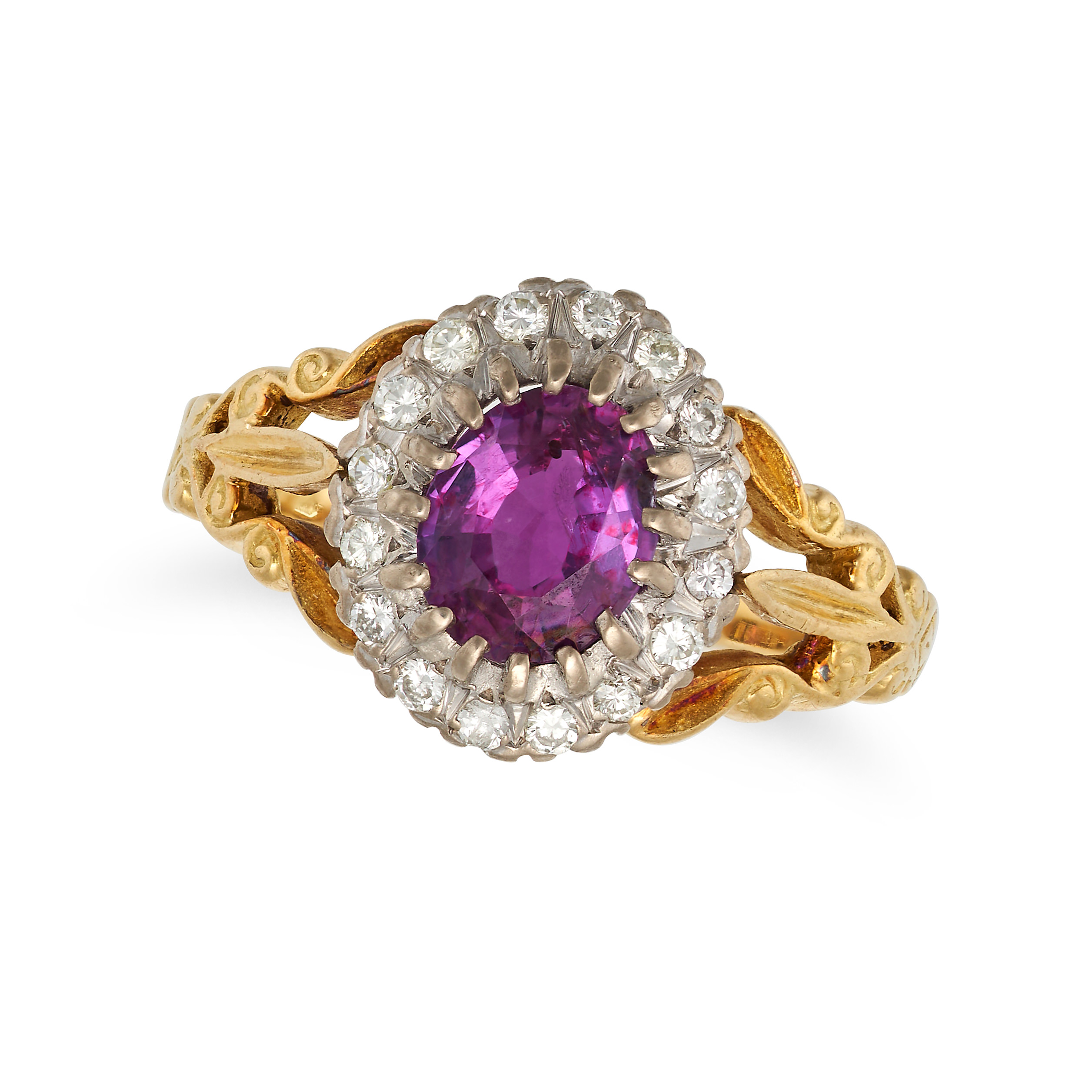 A RUBY AND DIAMOND CLUSTER RING in 18ct yellow gold, set with an oval cut ruby of approximately 1...