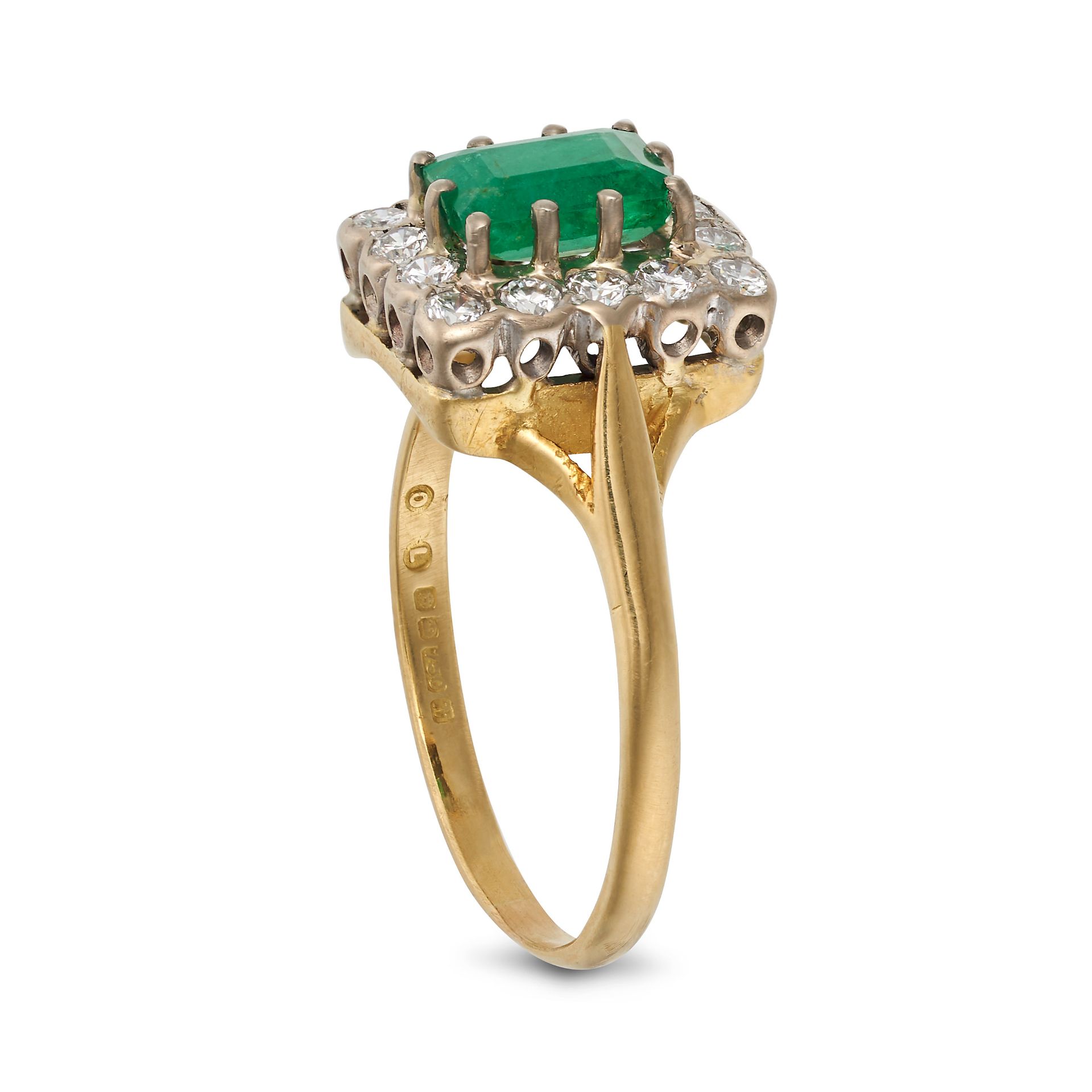 AN EMERALD AND DIAMOND CLUSTER RING in 18ct yellow gold, set with a rectangular step cut emerald ... - Image 2 of 2