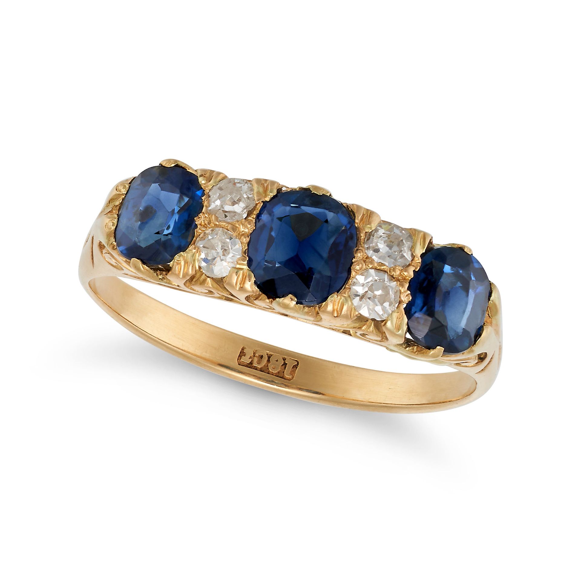 AN ANTIQUE SAPPHIRE AND DIAMOND RING in 18ct yellow gold, set with three cushion cut sapphires ac...
