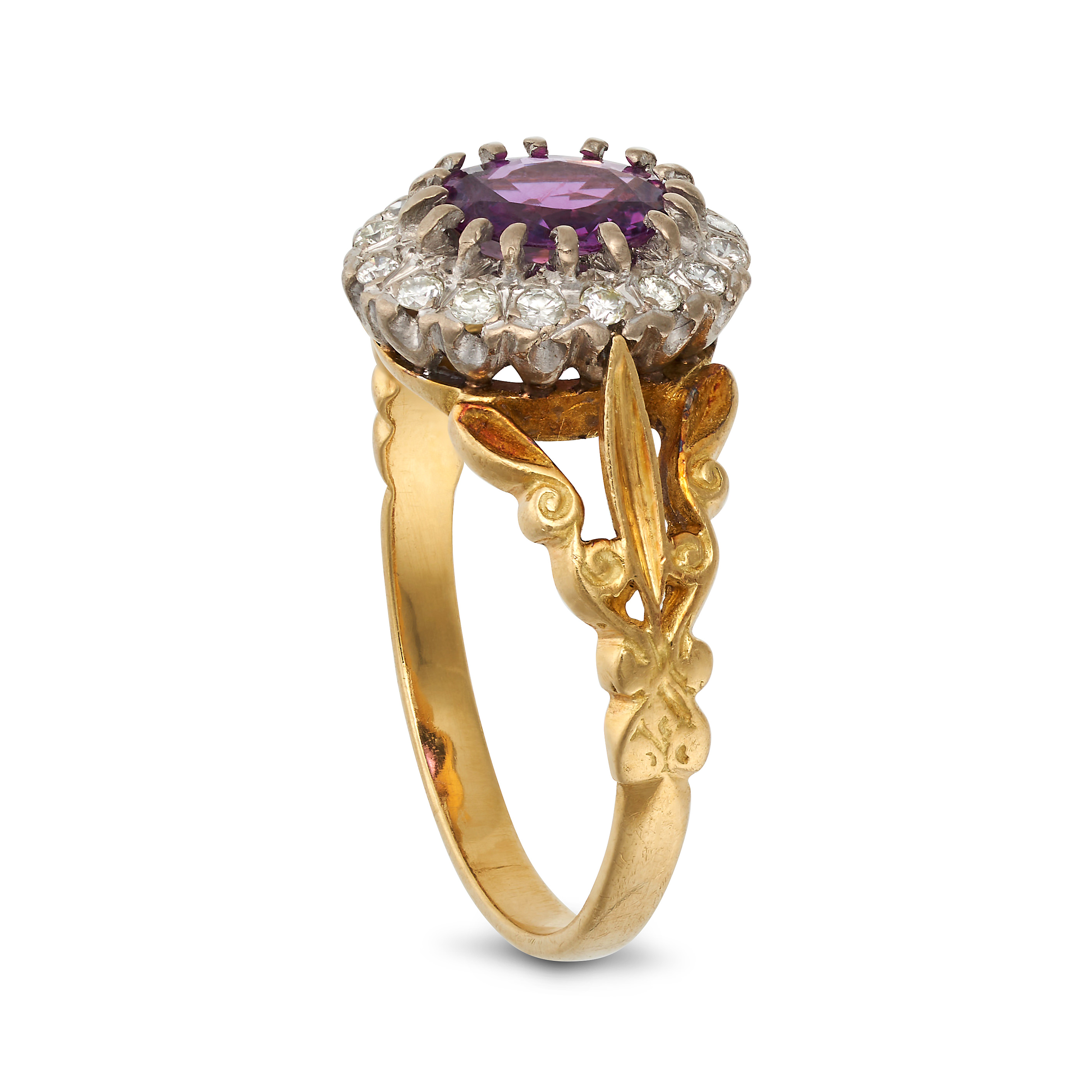 A RUBY AND DIAMOND CLUSTER RING in 18ct yellow gold, set with an oval cut ruby of approximately 1... - Image 2 of 2