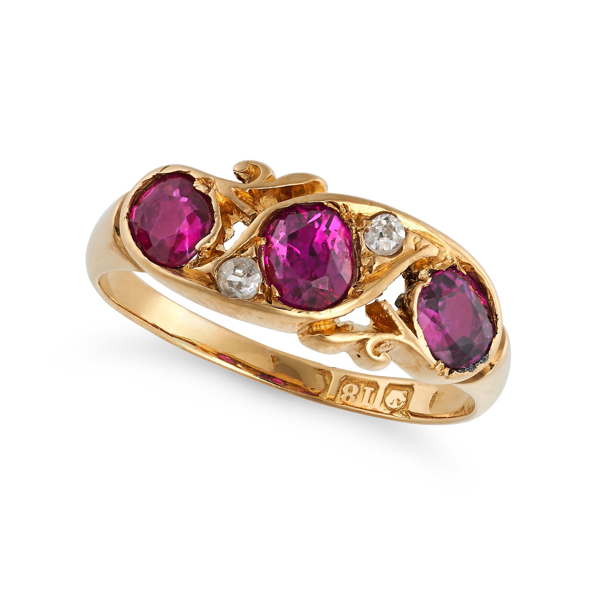 AN ANTIQUE RUBY AND DIAMOND RING in 18ct yellow gold, set with three cushion cut rubies accented ...