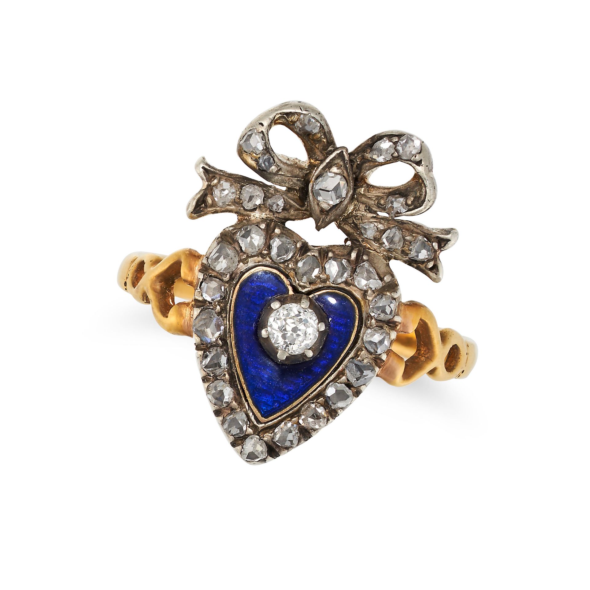 A DIAMOND AND ENAMEL SWEETHEART RING in yellow gold and silver, designed as a heart surmounted by...