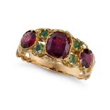 AN ANTIQUE GARNET AND EMERALD RING in yellow gold, set with three cushion cut garnets punctuated ...