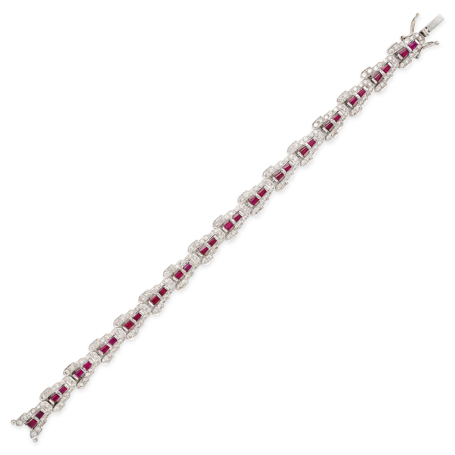 A RUBY AND DIAMOND BRACELET in 18ct white gold, comprising a row of sixteen links set with rectan...