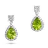 A PAIR OF PERIDOT AND DIAMOND DROP EARRINGS in 18ct white gold, each set with a cluster of round ...