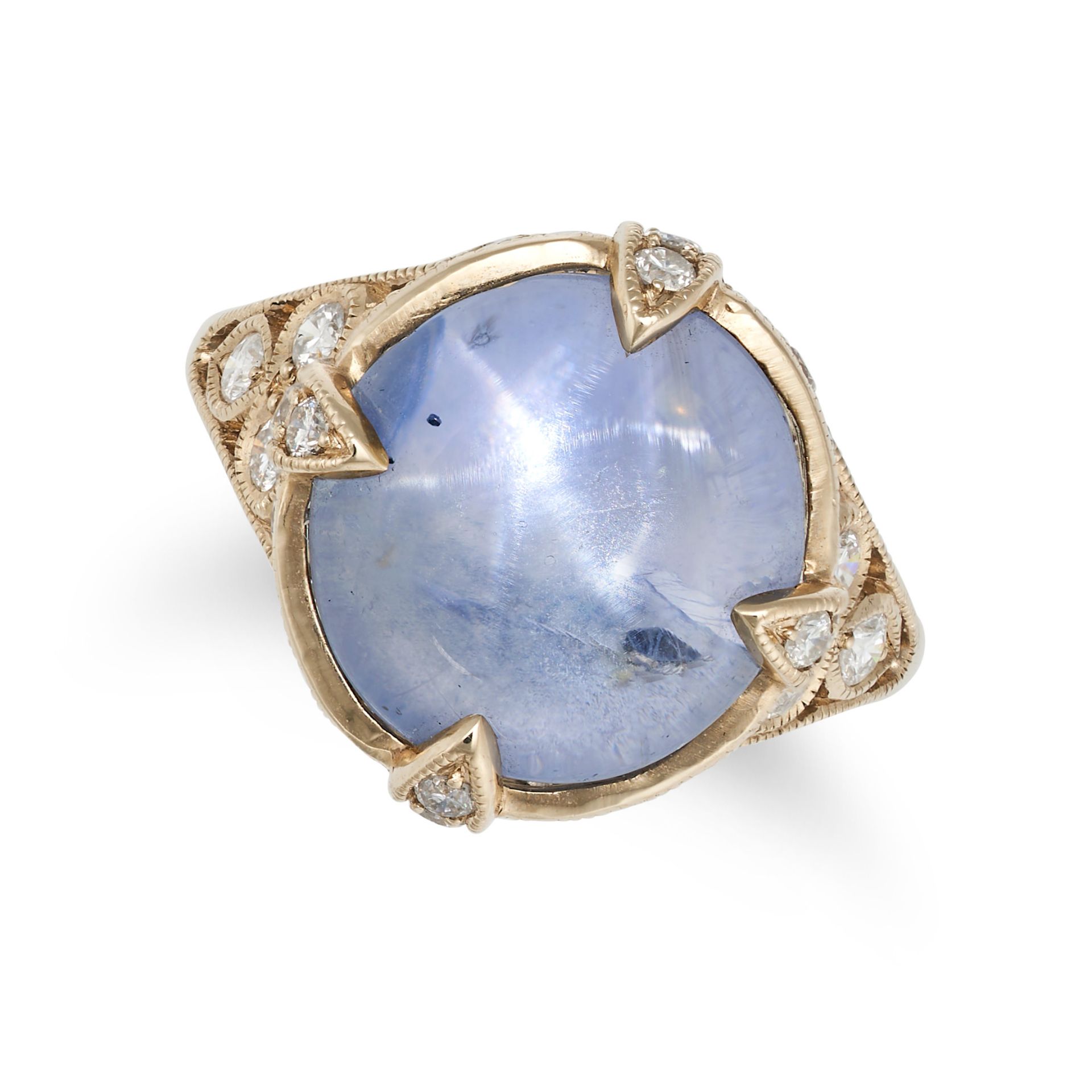 A STAR SAPPHIRE AND DIAMOND RING in 18ct yellow gold, set with a cabochon star sapphire of 10.85 ...