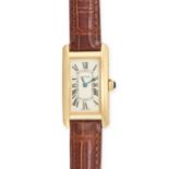 A LADIES CARTIER TANK AMERICAINE WRISTWATCH in 18ct yellow gold, model ref 1710, c.2000s the dial...