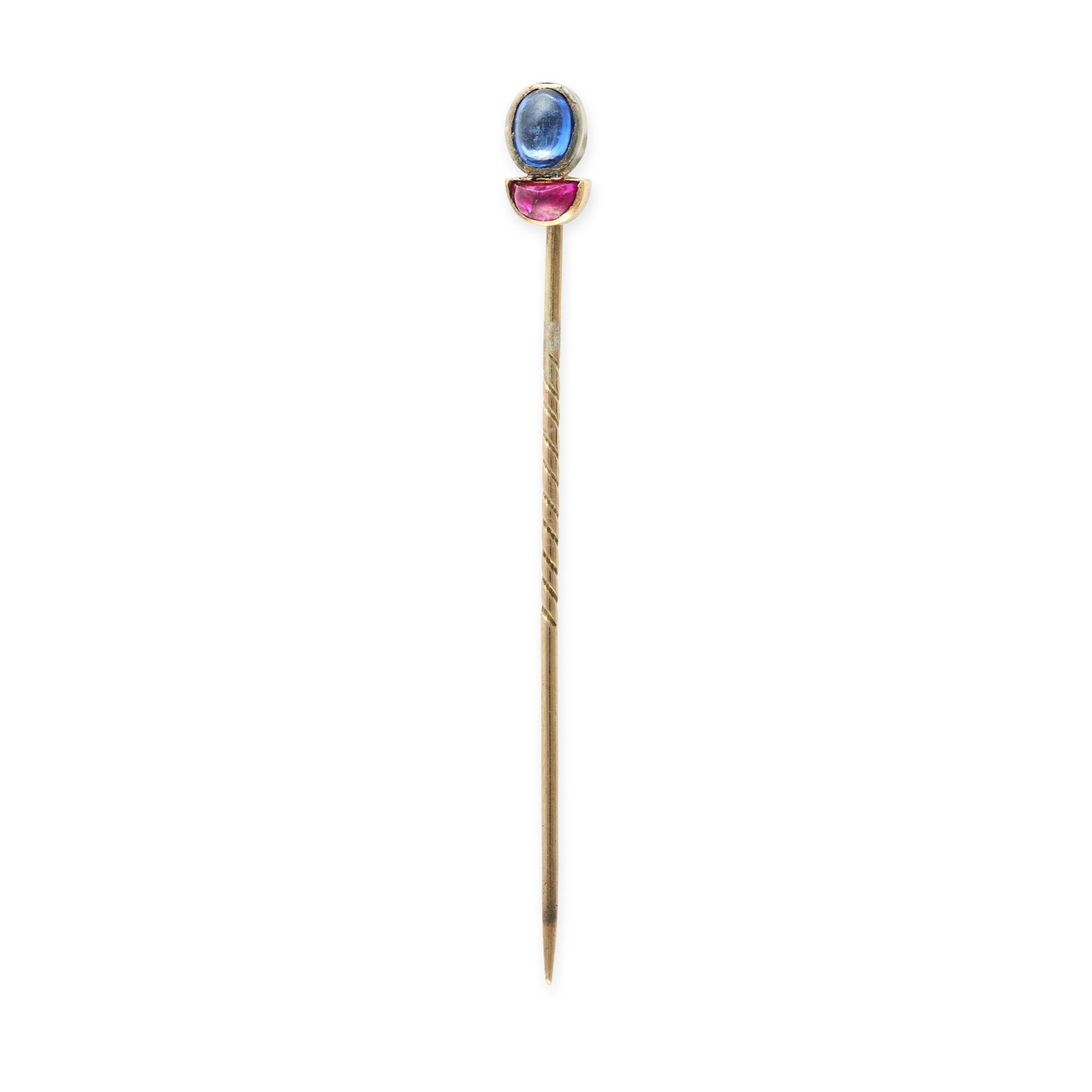 A SAPPHIRE AND RUBY STICK / TIE PIN in yellow gold, set with an oval cabochon sapphire and a half...