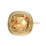 AN ANTIQUE TOPAZ BROOCH in yellow gold, set with a cushion cut topaz, no assay marks, 1.5cm, 2.5g.