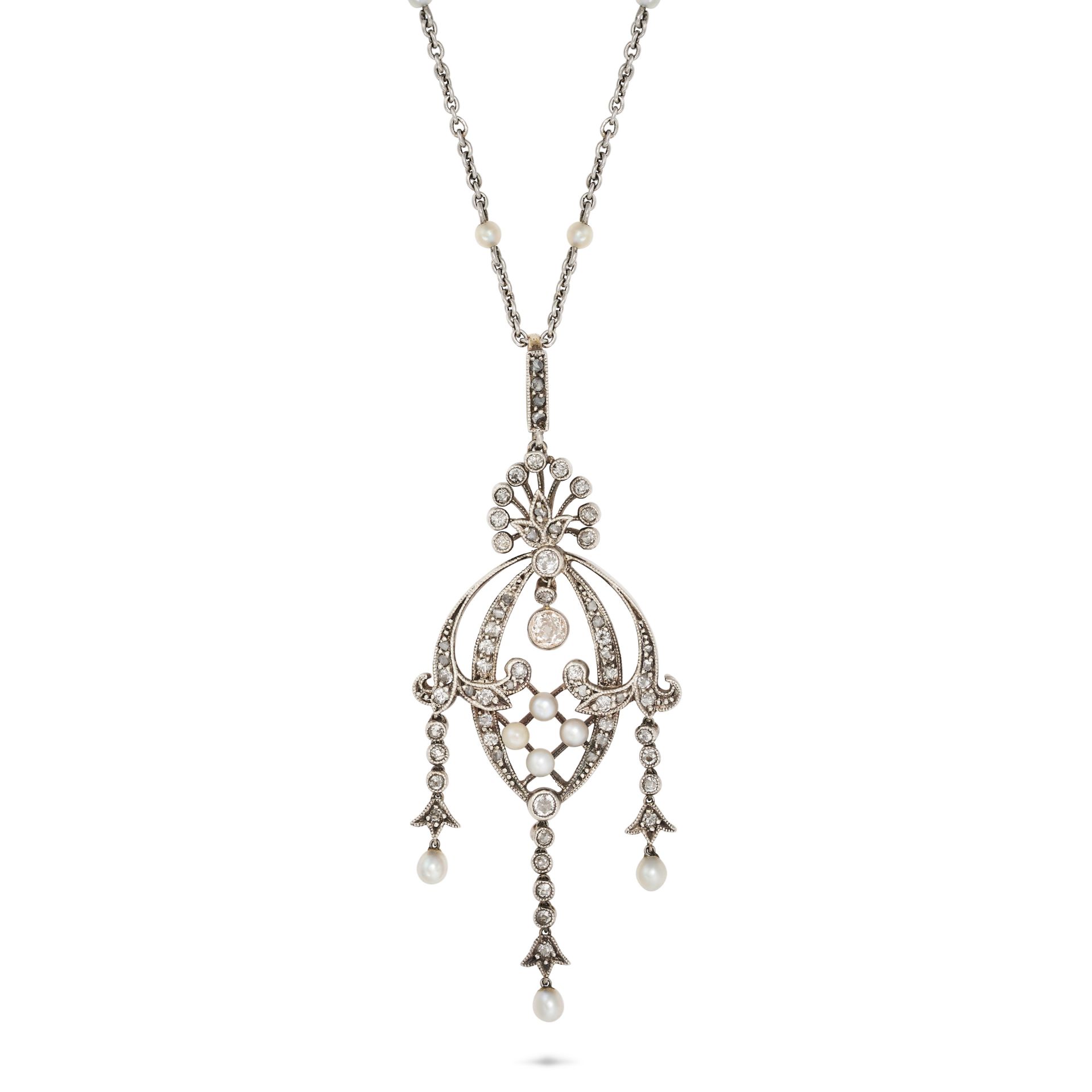 AN ANTIQUE EDWARDIAN DIAMOND AND PEARL PENDANT NECKLACE in platinum, silver, and yellow gold, the...
