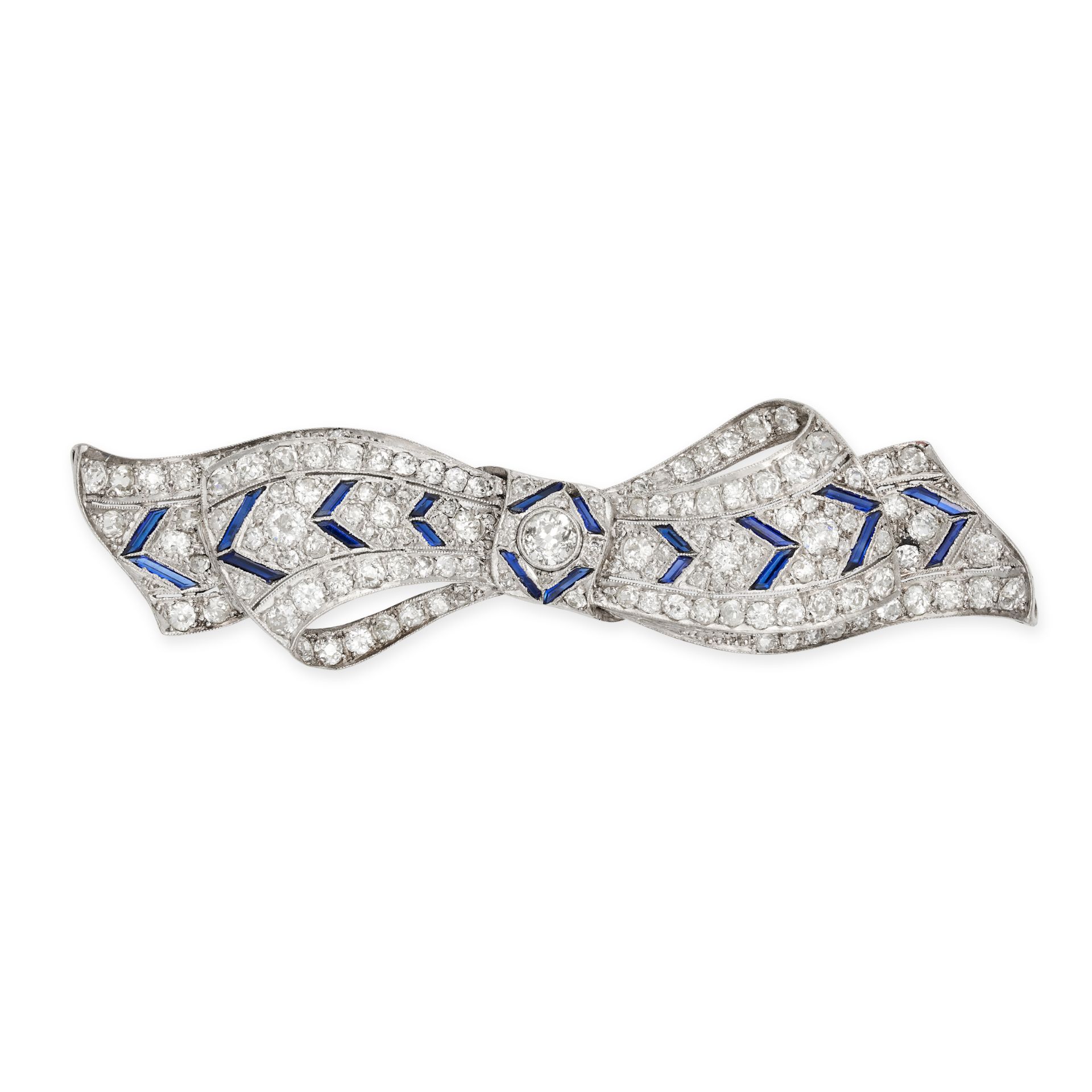 A DIAMOND & SAPPHIRE BOW BROOCH, 1940S in platinum, set with a central old cut diamond accented b...