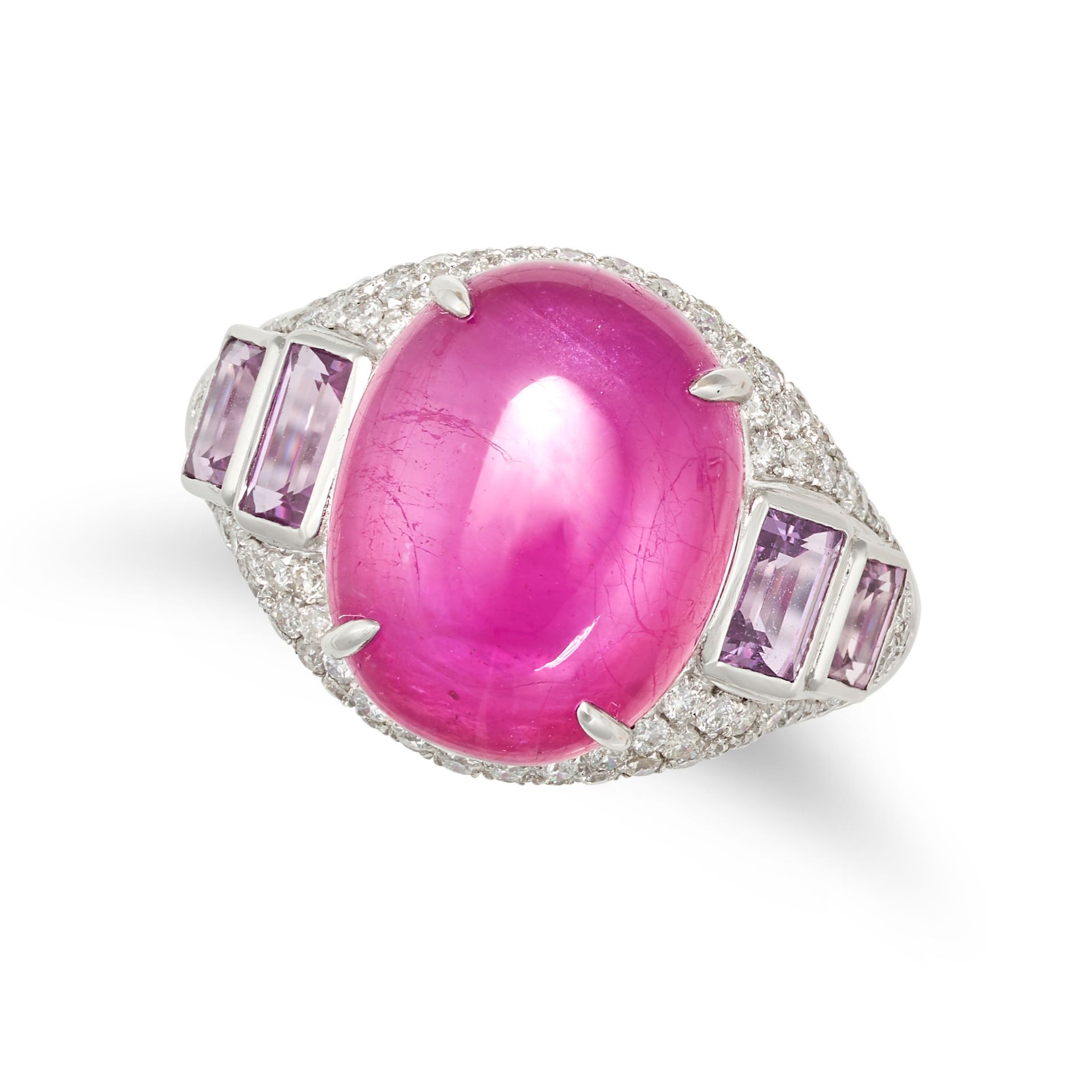 A RUBY, AMETHYST AND DIAMOND RING in 18ct white gold, set with an oval cabochon ruby of 10.80 car...