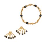 A COLLECTION OF GOLD JEWELLERY in 21ct yellow gold, including a bracelet in yellow gold accented ...