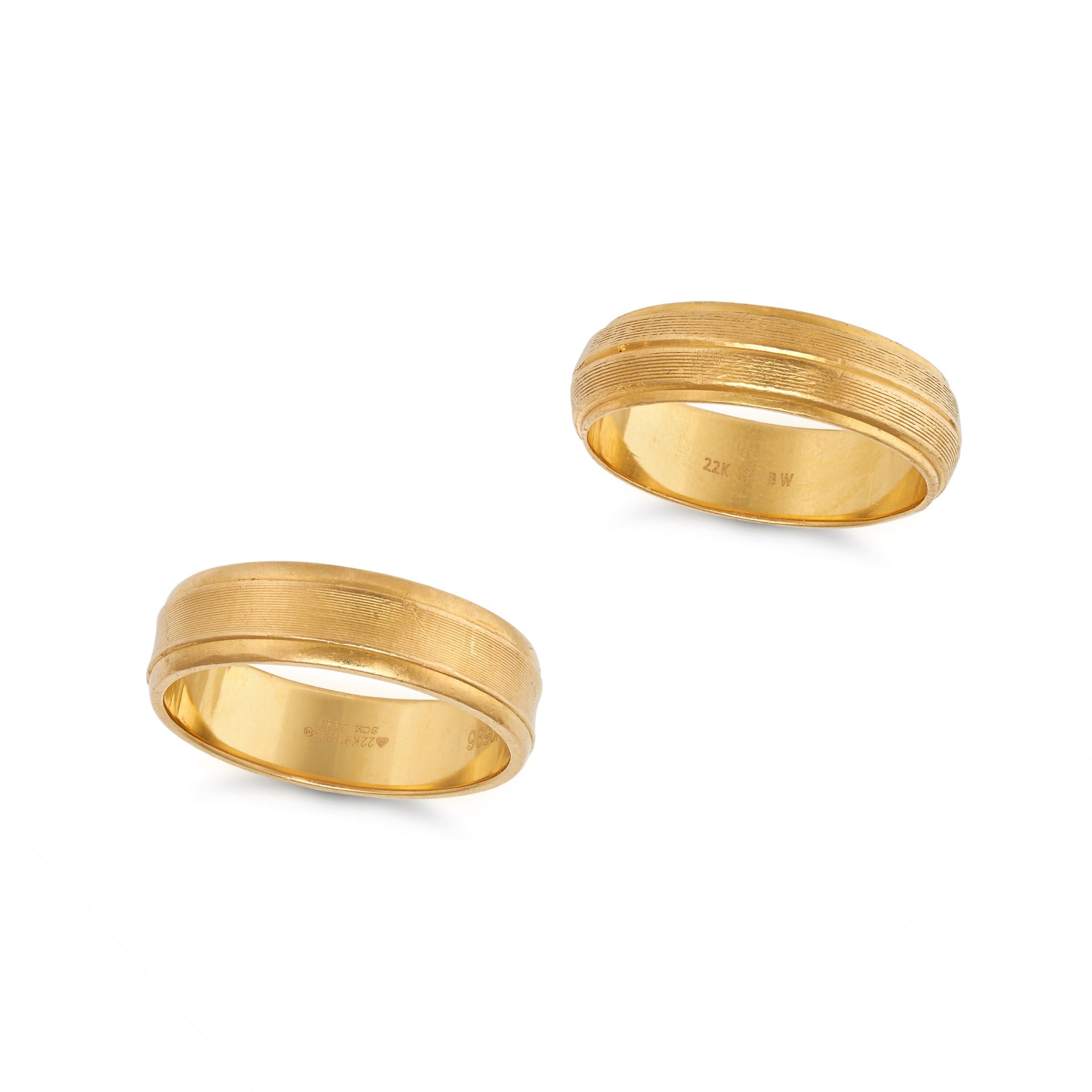 A PAIR OF GOLD BAND RINGS in 22ct yellow gold, one ring stamped 22K, size S / 9.25, the other rin...