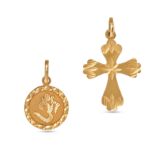 A PAIR OF RELIGIOUS CHARMS in 22ct yellow gold, one charm in the shape of a cross, no assay marks...