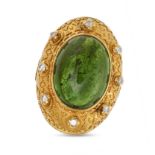 A GREEN TOURMALINE AND DIAMOND RING in 18ct yellow gold, set with a cabochon tourmaline of approx...