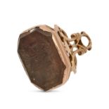 AN ANTIQUE INTAGLIO FOB SEAL PENDANT in rose gold, set with an octagonal smokey quartz carved wit...